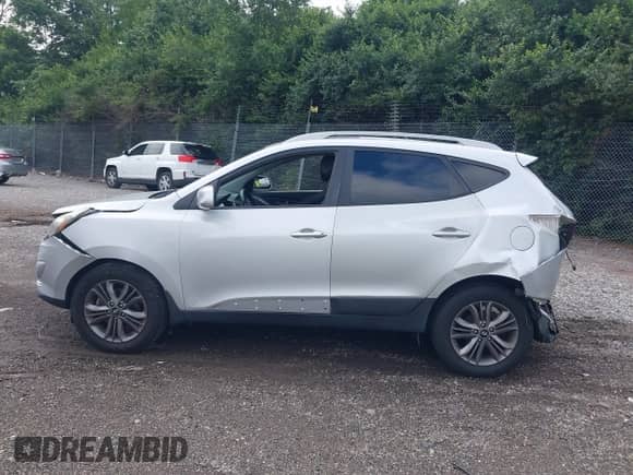 2014 Hyundai Tucson SE with VIN KM8JU3AG5EU831589, listed as a IAAI auction lot 42709097 with 147,199 mi miles and . Bid and sale history available at DreamBid. Image 15.