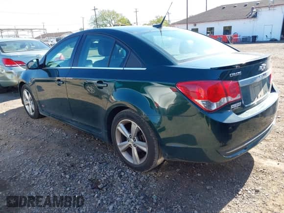 2014 Chevrolet Cruze 2LT with VIN 1G1PE5SB2E7360583, listed as a IAAI auction lot 43366884 with 108,973 mi miles and . Bid and sale history available at DreamBid. Image 3.