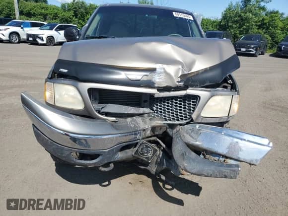 2001 Ford F-150 XL with VIN 1FTRX08L71KF02608, listed as a Copart auction lot 60115445 with 208,939 mi miles and Salvage title. Bid and sale history available at DreamBid. Image 5.