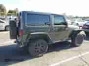 2016 Jeep Wrangler Willys Wheeler z VIN 1C4AJWAG8GL155954, wystawiony jako Copart lot #66468135 z przebiegiem 106 488 mil mil oraz Czysty tytuł • Clean title. Historia ofert i sprzedaży dostępna na DreamBid. Obrazek 3.