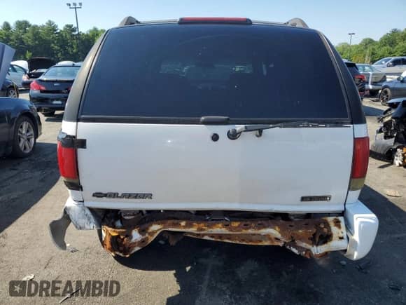 2004 Chevrolet Blazer LS z VIN 1GNDT13X24K106765, wystawiony jako Copart lot #60463984 z przebiegiem 106 705 mil mil oraz Czysty tytuł • Clean title. Historia ofert i sprzedaży dostępna na DreamBid. Obrazek 6.