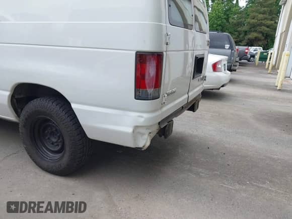 2010 Ford Econoline Cargo Commercial with VIN 1FTNE1EW5ADA04730, listed as a IAAI auction lot 42492388 with 292,200 mi miles and . Bid and sale history available at DreamBid. Image 14.