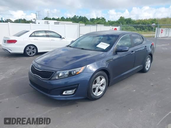 2015 Kia Optima LX with VIN 5XXGM4A75FG485281, listed as a IAAI auction lot 43314711 with 116,648 mi miles and . Bid and sale history available at DreamBid. Image 2.
