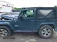 2018 Jeep Wrangler Sahara z VIN 1C4AJWBG3JL810088, wystawiony jako IAAI lot #42731417 z przebiegiem 125 855 mil mil oraz . Historia ofert i sprzedaży dostępna na DreamBid. Obrazek 14.