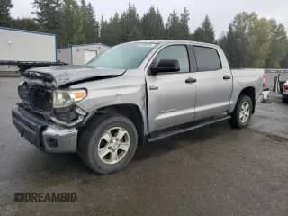 2014 Toyota Tundra SR5 z VIN 5TFDW5F14EX396784, wystawiony jako Copart lot #82590165 z przebiegiem 150 618 mil mil oraz Szkoda całkowita • Salvage title. Historia ofert i sprzedaży dostępna na DreamBid. Obrazek 1.