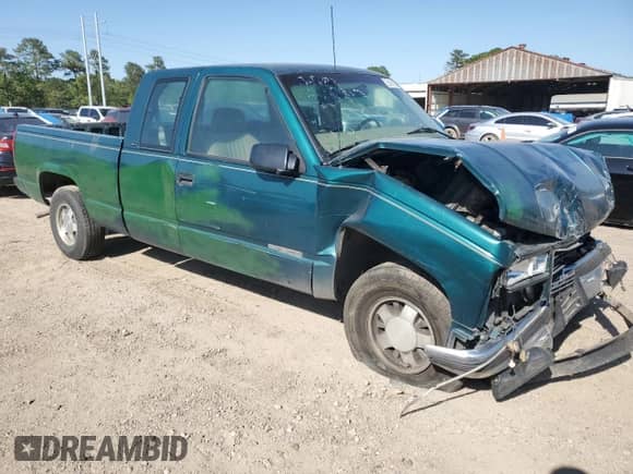 1998 GMC Sierra 1500 z VIN 1GTEC19W4WE521888, wystawiony jako Copart lot #53161505 z przebiegiem 985 004 mil mil oraz Szkoda całkowita • Salvage title. Historia ofert i sprzedaży dostępna na DreamBid. Obrazek 4.