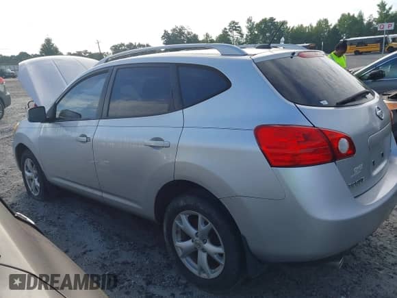 2008 Nissan Rogue S with VIN JN8AS58T68W301590, listed as a IAAI auction lot 43015305 with 124,692 mi miles and . Bid and sale history available at DreamBid. Image 3.