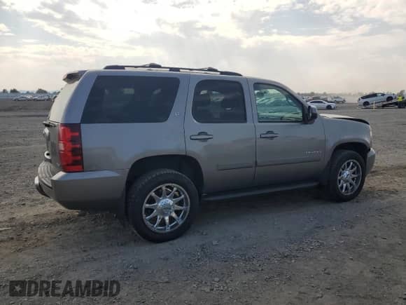 2007 Chevrolet Tahoe LTZ z VIN 1GNFK13087R404618, wystawiony jako Copart lot #71642725 z przebiegiem 219 920 mil mil oraz Szkoda całkowita • Salvage title. Historia ofert i sprzedaży dostępna na DreamBid. Obrazek 3.