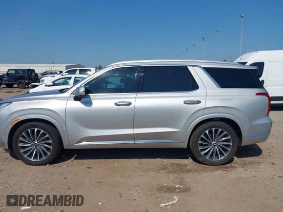 2023 Hyundai Palisade Calligraphy z VIN KM8R7DGE5PU572692, wystawiony jako IAAI lot #43012185 z przebiegiem 32 616 mil mil oraz . Historia ofert i sprzedaży dostępna na DreamBid. Obrazek 14.