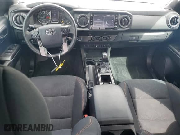 2020 Toyota Tacoma SR5 с VIN 3TMAZ5CNXLM128164, выставлен на аукционе Copart как лот 71077555 с пробегом 79 553 миль миль и Чистый • Clean title. История ставок и продаж доступна на DreamBid. Изображение 8.