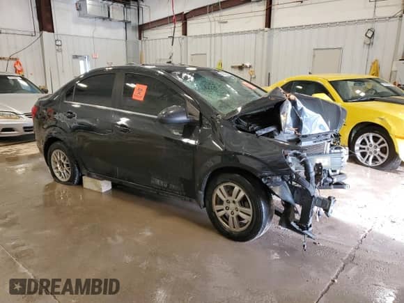 2015 Chevrolet Sonic LT с VIN 1G1JC5SB9F4175297, выставлен на аукционе Copart как лот 49162485 с пробегом Не указан миль и На запчасти • Non repairable. История ставок и продаж доступна на DreamBid. Изображение 4.