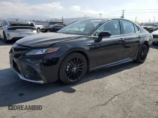 2021 Toyota Camry Hybrid XSE with VIN 4T1K31AK5MU549676, listed as a Copart auction lot 81924375 with 83,653 mi miles and Salvage title. Bid and sale history available at DreamBid. Image 1.
