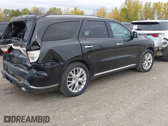 2015 Dodge Durango Citadel with VIN 1C4RDJEG9FC203094, listed as a IAAI auction lot 43451410 with 128,458 mi miles and . Bid and sale history available at DreamBid. Image 4.