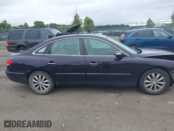 2007 Hyundai Azera SE with VIN KMHFC46F97A159636, listed as a IAAI auction lot 43033496 with 162,950 mi miles and . Bid and sale history available at DreamBid. Image 13.