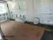 2007 Ford Econoline Cargo Commercial with VIN 1FTNE14W47DB49798, listed as a IAAI auction lot 42301270 with 361,650 mi miles and . Bid and sale history available at DreamBid. Image 8.