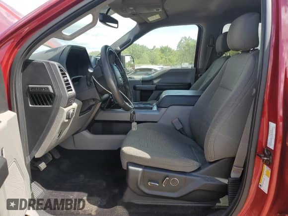 2015 Ford F-150 XLT с VIN 1FTEW1EG2FFC72233, выставлен на аукционе Copart как лот 71439965 с пробегом 102 687 миль миль и Списание • Salvage title. История ставок и продаж доступна на DreamBid. Изображение 7.