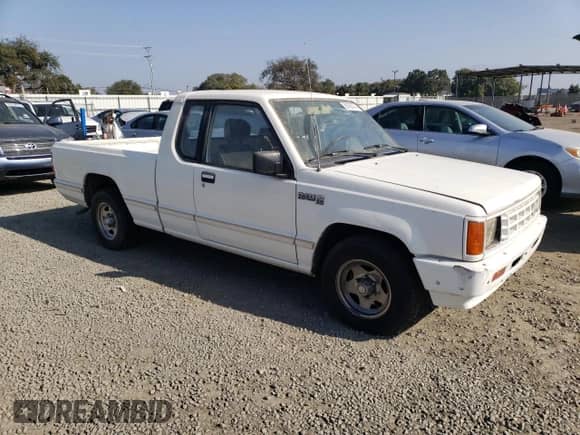 1989 Dodge RAM with VIN JB7FL55E0KP006393, listed as a Copart auction lot 82760774 with 148,071 mi miles and Clean title. Bid and sale history available at DreamBid. Image 4.