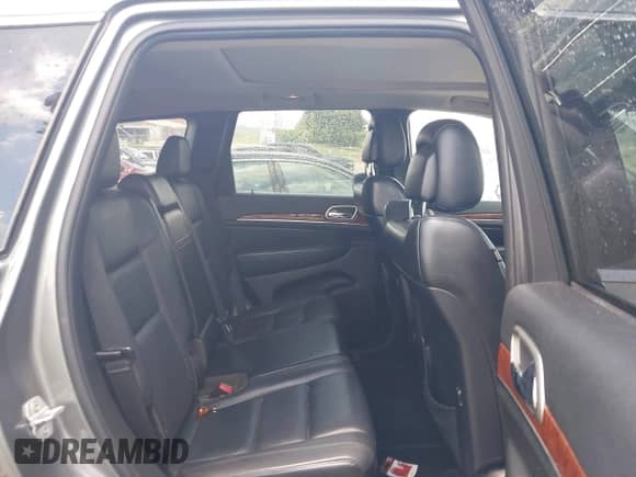 2012 Jeep Grand Cherokee Limited z VIN 1C4RJEBGXCC290696, wystawiony jako IAAI lot #42753634 z przebiegiem 205 808 mil mil oraz . Historia ofert i sprzedaży dostępna na DreamBid. Obrazek 8.