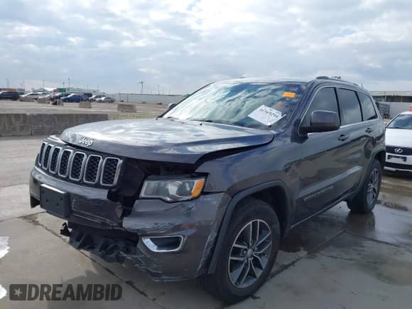 2018 Jeep Grand Cherokee Laredo z VIN 1C4RJEAG7JC450922, wystawiony jako IAAI lot #41169294 z przebiegiem 158 689 mil mil oraz . Historia ofert i sprzedaży dostępna na DreamBid. Obrazek 2.