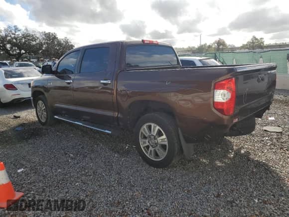 2016 Toyota Tundra Platinum with VIN 5TFGW5F1XGX205613, listed as a Copart auction lot 83857424 with 77,389 mi miles and Salvage title. Bid and sale history available at DreamBid. Image 2.