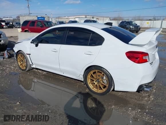 2020 Subaru WRX STI with VIN JF1VA2S69L9812905, listed as a IAAI auction lot 41880174 with 32,202 mi miles and . Bid and sale history available at DreamBid. Image 3.
