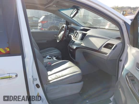 2011 Toyota Sienna XLE AAS with VIN 5TDYK3DC4BS030573, listed as a IAAI auction lot 43196976 with 290,800 mi miles and . Bid and sale history available at DreamBid. Image 5.
