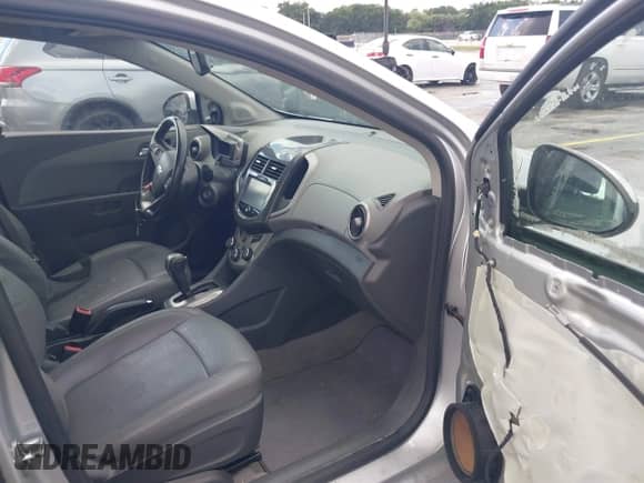 2015 Chevrolet Sonic LTZ with VIN 1G1JE6SB2F4103387, listed as a IAAI auction lot 43400010 with 74,902 mi miles and . Bid and sale history available at DreamBid. Image 5.