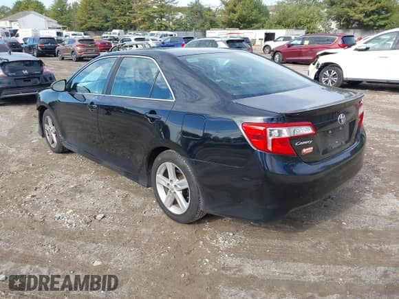 2014 Toyota Camry SE with VIN 4T1BF1FK7EU357256, listed as a IAAI auction lot 43436615 with 132,033 mi miles and . Bid and sale history available at DreamBid. Image 3.