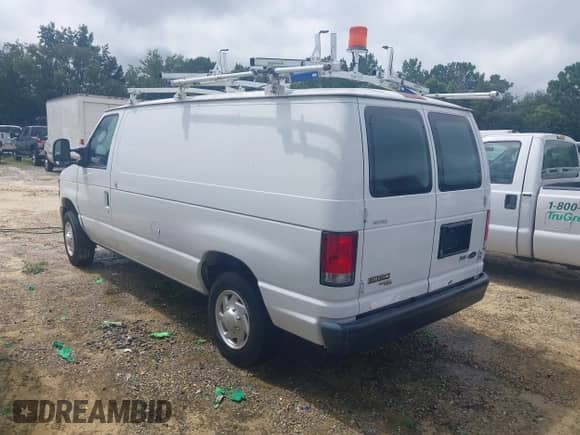 2013 Ford Econoline Cargo Commercial with VIN 1FTNE1EW7DDB01352, listed as a IAAI auction lot 42908765 with 102,950 mi miles and . Bid and sale history available at DreamBid. Image 3.
