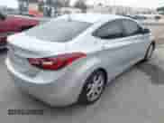 2013 Hyundai Elantra GLS z VIN KMHDH4AE6DU779474, wystawiony jako IAAI lot #42569044 z przebiegiem 95 106 mil mil oraz . Historia ofert i sprzedaży dostępna na DreamBid. Obrazek 4.