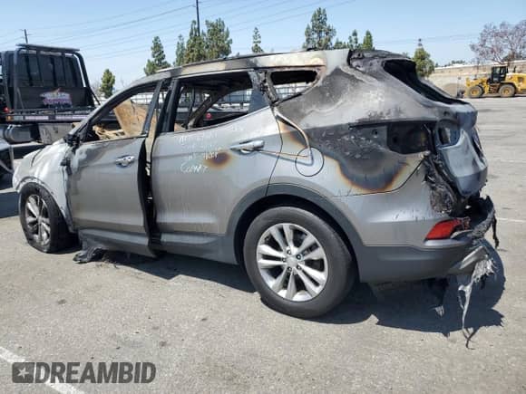 2018 Hyundai Santa Fe 2.0T with VIN 5NMZU4LA3JH106130, listed as a Copart auction lot 62910625 with Not provided miles and Salvage title. Bid and sale history available at DreamBid. Image 2.