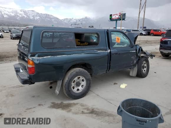 1998 Toyota Tacoma z VIN 4TAPM62N0WZ025379, wystawiony jako Copart lot #51533085 z przebiegiem 127 881 mil mil oraz Szkoda całkowita • Salvage title. Historia ofert i sprzedaży dostępna na DreamBid. Obrazek 3.