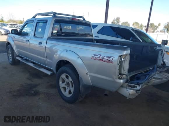 2003 Nissan Frontier SVE with VIN 1N6MD29Y63C465571, listed as a IAAI auction lot 41502613 with 175,996 mi miles and . Bid and sale history available at DreamBid. Image 3.