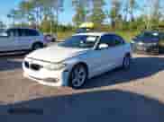 2014 BMW 3 Series 320i z VIN WBA3B1G50ENN90318, wystawiony jako IAAI lot #43484910 z przebiegiem 198 051 mil mil oraz . Historia ofert i sprzedaży dostępna na DreamBid. Obrazek 2.