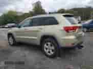 2012 Jeep Grand Cherokee Laredo z VIN 1C4RJFAG0CC156397, wystawiony jako Copart lot #87400775 z przebiegiem 165 192 mil mil oraz Szkoda całkowita • Salvage title. Historia ofert i sprzedaży dostępna na DreamBid. Obrazek 2.
