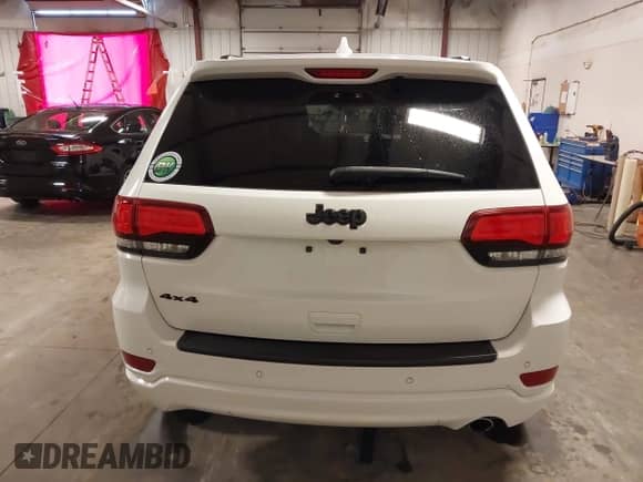 2020 Jeep Grand Cherokee Altitude with VIN 1C4RJFAGXLC104551, listed as a IAAI auction lot 42723807 with 90,917 mi miles and . Bid and sale history available at DreamBid. Image 17.