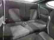 2004 Hyundai Tiburon GS z VIN KMHHM65D74U127053, wystawiony jako Copart lot #84396475 z przebiegiem 89 271 mil mil oraz Czysty tytuł • Clean title. Historia ofert i sprzedaży dostępna na DreamBid. Obrazek 10.