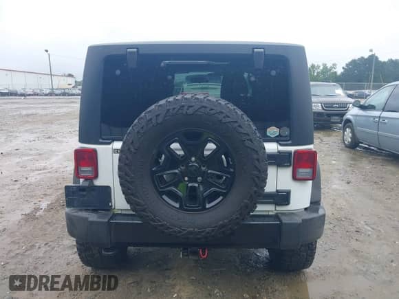 2015 Jeep Wrangler Sport with VIN 1C4AJWAG1FL593777, listed as a IAAI auction lot 42952137 with 99,393 mi miles and . Bid and sale history available at DreamBid. Image 17.