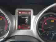 2012 Dodge Journey American Value z VIN 3C4PDCAB6CT372258, wystawiony jako IAAI lot #43049509 z przebiegiem 230 033 mil mil oraz . Historia ofert i sprzedaży dostępna na DreamBid. Obrazek 7.