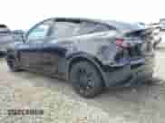 2022 Tesla Model Y Long Range with VIN 7SAYGAEE0NF340771, listed as a Copart auction lot 85189405 with 60,930 mi miles and Salvage title. Bid and sale history available at DreamBid. Image 2.