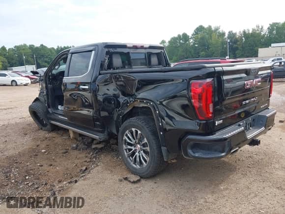 2020 GMC Sierra 1500 Denali with VIN 1GTU9FEL0LZ150414, listed as a IAAI auction lot 43123862 with 104,295 mi miles and . Bid and sale history available at DreamBid. Image 3.