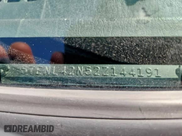 2002 Toyota Tacoma с VIN 5TENL42N52Z144191, выставлен на аукционе Copart как лот 83793165 с пробегом 151 018 миль миль и Чистый • Clean title. История ставок и продаж доступна на DreamBid. Изображение 12.