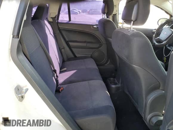 2010 Dodge Caliber SXT with VIN 1B3CB4HA3AD595658, listed as a Copart auction lot 85376495 with 209,626 mi miles and Salvage title. Bid and sale history available at DreamBid. Image 10.