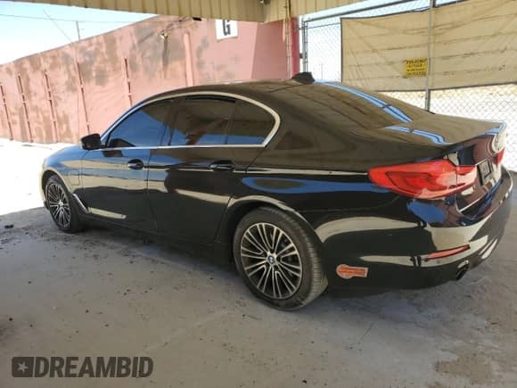 2020 BMW 5 Series 530e with VIN WBAJA9C01LCD69759, listed as a Copart auction lot 58271025 with 56,732 mi miles and Salvage title. Bid and sale history available at DreamBid. Image 2.