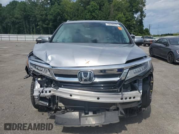 2020 Honda Pilot Elite с VIN 5FNYF6H08LB017983, выставлен на аукционе Copart как лот 70290555 с пробегом 77 178 миль миль и Списание • Salvage title. История ставок и продаж доступна на DreamBid. Изображение 5.