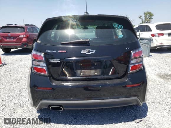 2018 Chevrolet Sonic LT с VIN 1G1JD6SB4J4102298, выставлен на аукционе Copart как лот 53454255 с пробегом 70 076 миль миль и Списание • Salvage title. История ставок и продаж доступна на DreamBid. Изображение 6.