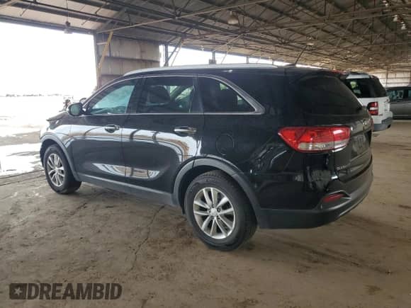 2018 Kia Sorento LX with VIN 5XYPG4A58JG368840, listed as a Copart auction lot 82337345 with 142,126 mi miles and Salvage title. Bid and sale history available at DreamBid. Image 2.
