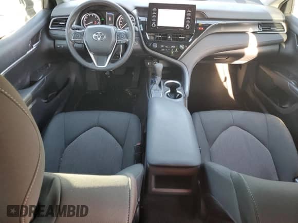 2023 Toyota Camry LE with VIN 4T1R11AK7PU084875, listed as a Copart auction lot 55857395 with 26,473 mi miles and Salvage title. Bid and sale history available at DreamBid. Image 8.