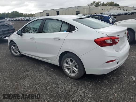2017 Chevrolet Cruze LT z VIN 1G1BE5SM6H7215949, wystawiony jako Copart lot #81203235 z przebiegiem 31 864 mil mil oraz Szkoda całkowita • Salvage title. Historia ofert i sprzedaży dostępna na DreamBid. Obrazek 2.