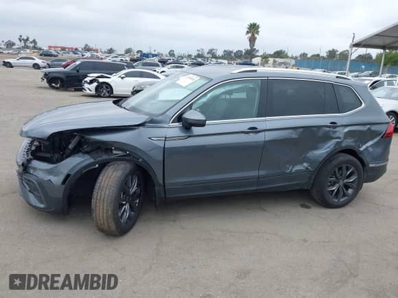 2023 Volkswagen Tiguan SE with VIN 3VV3B7AX0PM130980, listed as a IAAI auction lot 42158302 with 30,653 mi miles and . Bid and sale history available at DreamBid. Image 15.